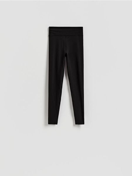 Gładkie legginsy - czarny. Czarne legginsy Reserved, l, bez wzorów, z dzianiny. Za 89.99 zł.