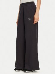 Reebok Spodnie dresowe 100214071 139-18-00 Czarny Regular Fit. Czarne spodnie dresowe Reebok, l, bez wzorów, z bawełny. Za 199.99 zł.