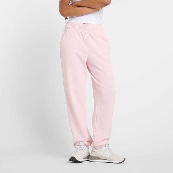 Spodnie damskie New Balance WP41500RSG – różowe. Czerwone spodnie dresowe New Balance, m, bez wzorów, z bawełny. Za 169.99 zł.