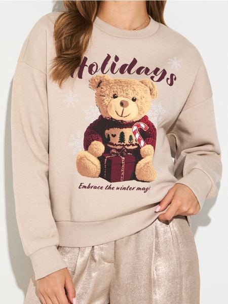 Bluza crewneck z motywem świątecznym - beżowy. Brązowe bluzy Sinsay, l, bez wzorów, bez kaptura. Za 39.99 zł.