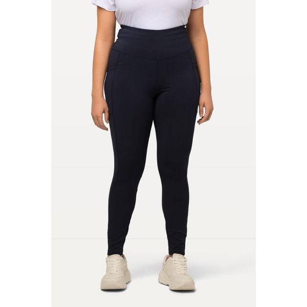 Damskie Legginsy sportowe szybkoschnące bardzo elastyczne. Niebieskie legginsy Ulla Popken, plus size, bez wzorów, z materiału. Za 239.99 zł.