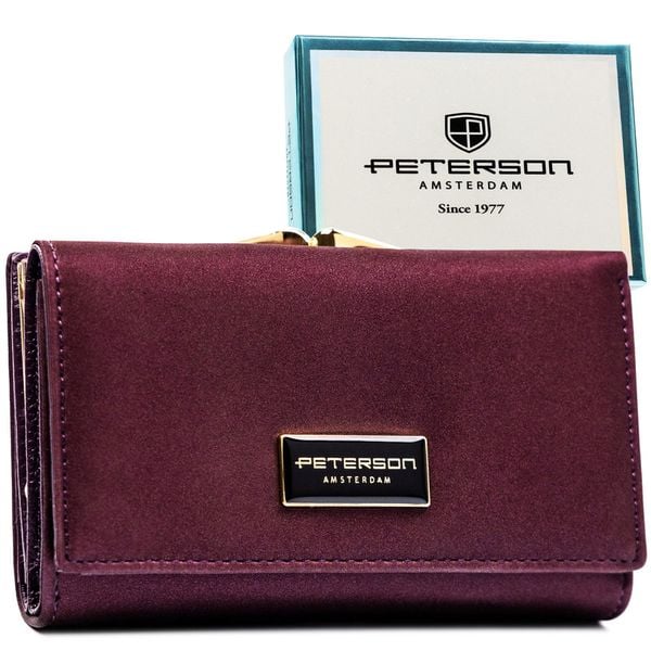 Fioletowy portfel damski wykonany ze skóry naturalnej i ekologicznej zamykany zatrzaskiem i biglem PTN PS108-HNL Peterson. Fioletowe portfele Peterson, bez wzorów, ze skóry. Za 129.99 zł.
