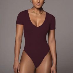 Body z krótkim rękawem i dekoltem V elastyczne Ieteke. Body Intica, m, bez wzorów. Za 109.00 zł.