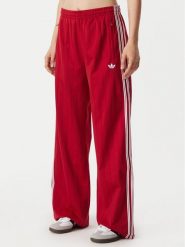 Adidas Spodnie dresowe Pinstripe Firebird Loose Trackpant KS9977 Czerwony Wide Leg. Czerwone spodnie dresowe Adidas, s, bez wzorów, z dresówki. Za 299.99 zł.