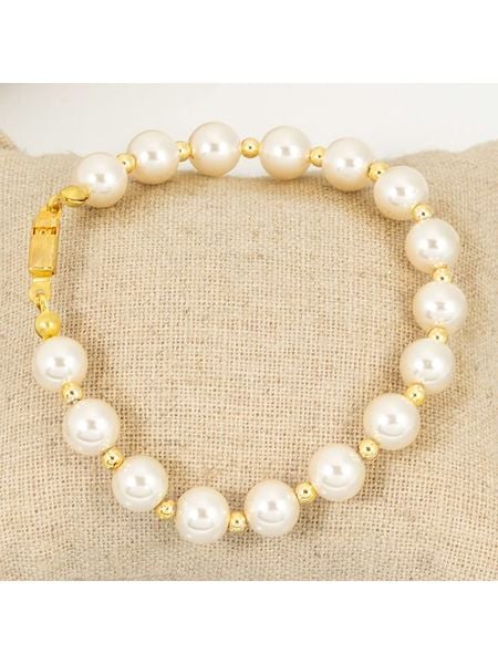 MENTHE À L'O Pozłacana bransoletka rozmiar: onesize. Żółte bransoletki MENTHE À L'O, z perłą, pozłacane. Za 78.28 zł.