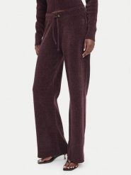 Juicy Couture Spodnie dresowe JCWEB006 Czarny Regular Fit. Czarne spodnie dresowe Juicy Couture, xxs, bez wzorów, z dresówki. Za 549.99 zł.