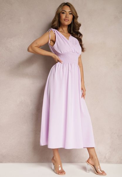 Jasnofioletowa Rozkloszowna Sukienka na Cienkich Ramiączkach z Kopertowym Dekoltem Eilinestia. Fioletowe sukienki Renee, na co dzień, l, bez wzorów, bez kołnierzyka, bez ramiączek, maxi, kopertowe. Za 69.99 zł.