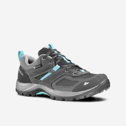 Buty turystyczne damskie Quechua MH100 niskie WTP. Niebieskie trekkingi QUECHUA, z kauczuku, trekkingowe. Za 229.99 zł.