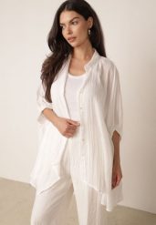 Biała Zwiewna Koszula Letnia Oversize z Bawełny o Nietoperzowym Kroju Canomela. Białe koszule Born2be, l, bez wzorów, z bawełny, eleganckie, bez kołnierzyka, bez ramiączek. Za 139.99 zł.