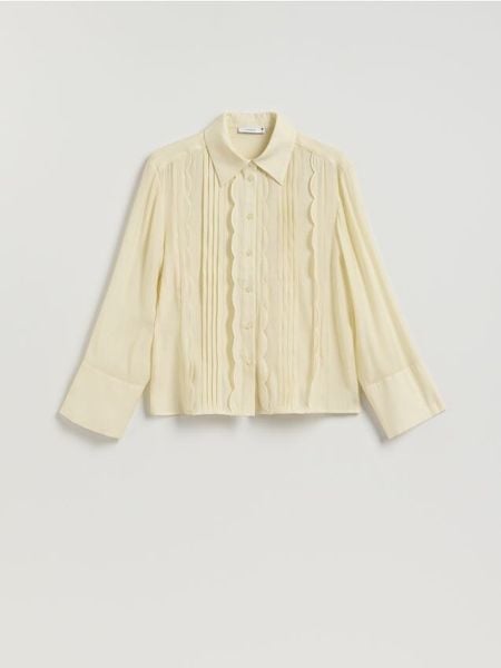 Koszula z ozdobnymi detalami - złamana biel. Koszule Reserved, l, bez wzorów, z tkaniny, klasyczne, bez kołnierzyka, bez ramiączek. Za 159.99 zł.