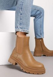 Ciemnobeżowe Botki za Kostkę z Protektorem Pestarin. Brązowe botki Renee, bez wzorów, za kostkę, bez obcasa, na płaskiej podeszwie, bez zapięcia. Za 149.99 zł.
