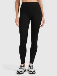 Legginsy treningowe bawełniane damskie czarne 4F Czarny XS. Czarne legginsy 4f, xs, bez wzorów, z bawełny. Za 79.99 zł.