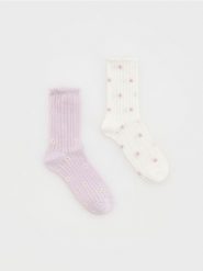 Skarpetki 2 pack - złamana biel. Skarpety Reserved, bez wzorów. W wyprzedaży za 32.99 zł.