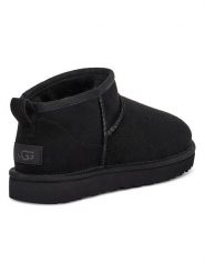 UGG Skórzane botki w kolorze czarnym rozmiar: 40. Czarne botki UGG, bez wzorów, z wełny, z okrągłym noskiem, bez obcasa, bez zapięcia. Za 571.03 zł.