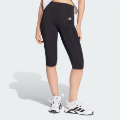 Legginsy Optime Essentials Capri. Czarne legginsy Adidas, l, bez wzorów, z elastanu. Za 199.00 zł.