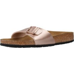 Klapki damskie Birkenstock Madrid. Żółte klapki Birkenstock, bez wzorów, z materiału, bez obcasa. Za 279.00 zł.