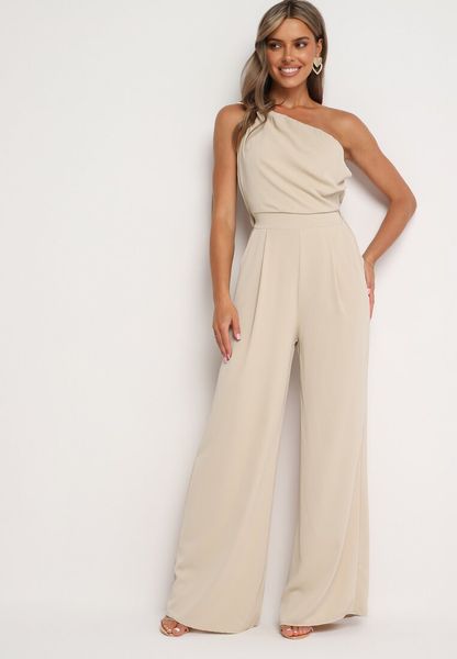 Beżowy Kombinezon Asymetryczny na Jedno Ramię z Dwoma Kieszeniami Benama. Brązowe sukienki Born2be, na imprezę, m, bez wzorów, eleganckie, z asymetrycznym kołnierzem, bez ramiączek, asymetryczne. Za 129.99 zł.