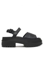 Converse Sandały Chuck Taylor All Star Lugged Heel A12189C Czarny. Czarne sandały Converse, bez wzorów, ze skóry, retro, bez obcasa, na płaskiej podeszwie, bez zapięcia. Za 229.99 zł.