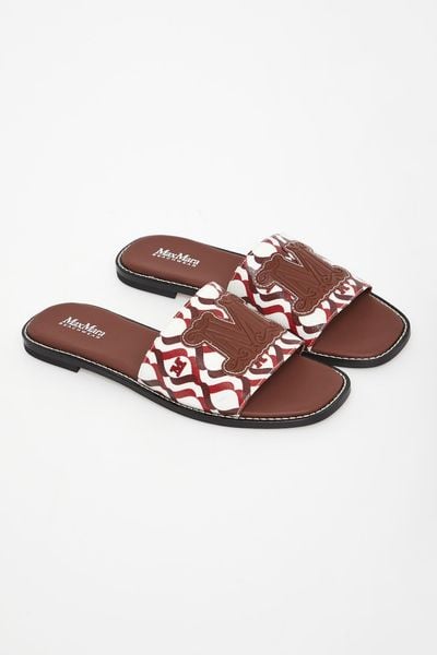 Klapki damskie skórzane Dovere MAX MARA BEACHWEAR. Klapki Max Mara Beachwear, bez wzorów, bez obcasa. Za 979.00 zł.