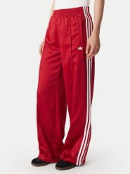 Adidas Spodnie dresowe Satin Sst Loose Trackpant KS7338 Czerwony Relaxed Fit. Czerwone spodnie dresowe Adidas, xl, bez wzorów, z dresówki. Za 349.99 zł.