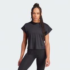 Koszulka Studio. Czarne bluzki Adidas, xs, bez wzorów, z materiału, sportowe, bez kołnierzyka, bez ramiączek. W wyprzedaży za 137.50 zł.
