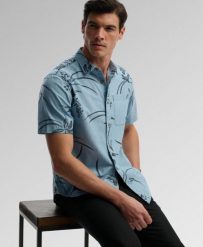 Superdry Koszula Vintage Loom krótki rękaw z bawełny organicznej. Niebieskie koszule Superdry, xl, bez wzorów, z bawełny, klasyczne, bez kołnierzyka, bez ramiączek. Za 229.00 zł.