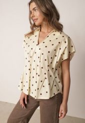 Żółta Bluzka o Fasonie Oversize w Kropki z Bawełny Pireia. Żółte bluzki Born2be, l, bez wzorów, z bawełny, biznesowe, bez kołnierzyka, bez ramiączek. Za 139.99 zł.
