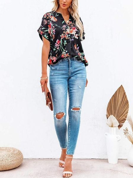 Milan Kiss Bluzka w kolorze czarnym ze wzorem rozmiar: M. Czarne bluzki Milan Kiss, m, bez wzorów, bez kołnierzyka, bez ramiączek. Za 118.28 zł.