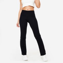 Legginsy fitness damskie Domyos rozkloszowane. Czarne legginsy DOMYOS, l, bez wzorów, z bawełny. Za 69.99 zł.