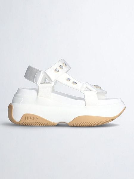 Liu Jo Sandały w kolorze białym na koturnie rozmiar: 38. Białe sandały Liu Jo, bez wzorów, z otwartym noskiem, bez obcasa, na koturnie, bez zapięcia. Za 361.87 zł.