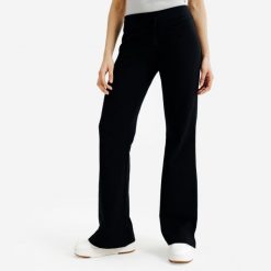 Rozszerzane legginsy damskie Elementals. Czarne legginsy DECATHLON, s, bez wzorów, z bawełny. Za 89.99 zł.