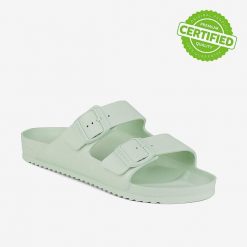 Klapki damskie Coqui z anatomiczną wkładką. Zielone klapki Coqui, bez wzorów, bez obcasa, na płaskiej podeszwie. Za 125.99 zł.