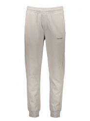 Calvin Klein Spodnie dresowe w kolorze kremowym rozmiar: M. Brązowe spodnie dresowe Calvin Klein, m, bez wzorów, z bawełny. Za 239.99 zł.