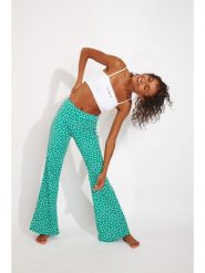 Banana Moon Spodnie "Bloomgirl" w kolorze zielonym rozmiar: 36. Zielone spodnie materiałowe Banana Moon, bez wzorów, z materiału. Za 130.99 zł.