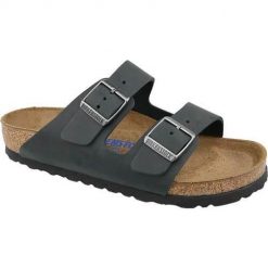 Klapki damskie Birkenstock Arizona. Czarne klapki Birkenstock, bez wzorów, z materiału, bez obcasa. Za 853.00 zł.