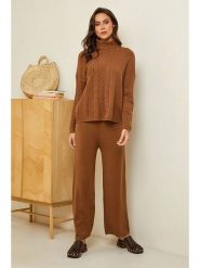 Soft Cashmere Spodnie w kolorze jasnobrązowym rozmiar: 38/40. Brązowe spodnie materiałowe Soft Cashmere, bez wzorów, z kaszmiru. Za 148.26 zł.