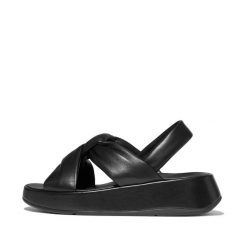 Sandały damskie FitFlop F-Mode Knot Soft-Leather Flatform B/Strap. Czarne sandały Flip Flop, bez wzorów, ze skóry, eleganckie, bez obcasa, na płaskiej podeszwie, bez zapięcia. Za 583.00 zł.