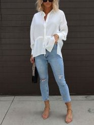 Milan Kiss Bluzka w kolorze białym rozmiar: L. Białe bluzki Milan Kiss, l, bez wzorów, z bawełny, bez kołnierzyka, bez ramiączek. Za 152.99 zł.