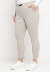 Jasnobeżowe Spodnie z Nogawkami 7/8 i Kieszeniami Gavotta. Brązowe spodnie materiałowe Born2be, na co dzień, l, bez wzorów, z jeansu, plus size. Za 69.99 zł.