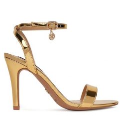 Sandały Nine West. Żółte sandały Nine West, bez wzorów, bez obcasa, na szpilce, bez zapięcia. Za 229.99 zł.