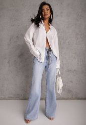 Niebieskie Szerokie Jeansy z Bawełny High Waist z Paskiem w Stylu Sznurówki Vetinia. Niebieskie jeansy Renee, l, bez wzorów, z podwyższonym stanem. Za 139.99 zł.