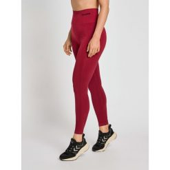 Damskie wysokie legginsy Hummel TIF. Czerwone legginsy Hummel, bez wzorów, z poliamidu, z podwyższonym stanem. Za 139.00 zł.