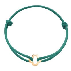 Bransoletka z pozłacaną ażurową koniczyną na grubym sznurku w kolorze morskiej zieleni. Zielone bransoletki Lilou, pozłacane. Za 89.00 zł.