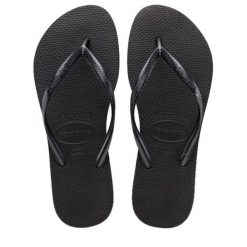 Klapki Havaianas Model 4000030 Kolor Czarny. Czarne klapki Havaianas, bez wzorów, z gumy, bez obcasa. Za 71.99 zł.