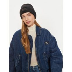 Czapka Calvin Klein. Czarne czapki Calvin Klein, bez wzorów. Za 329.99 zł.