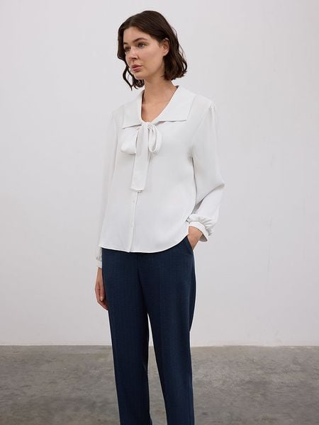 BGN Bluzka w kolorze białym rozmiar: 38. Białe bluzki BGN, bez wzorów, bez kołnierzyka, bez ramiączek. Za 131.12 zł.