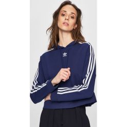 Adidas Originals - Bluza. Niebieskie bluzy Adidas Originals, z aplikacjami, z bawełny, z kapturem. W wyprzedaży za 179.90 zł.