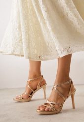 Szampańskie Sandały VICES na Szpilce Ozdobione Geometrycznymi Paskami Nahmora. Żółte sandały Renee, bez wzorów, eleganckie, bez obcasa, na obcasie, bez zapięcia. Za 119.99 zł.