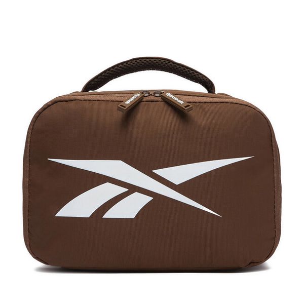 Kosmetyczka Reebok. Brązowe kufry i kosmetyczki Reebok, bez wzorów, z materiału, bez dodatków. Za 79.99 zł.