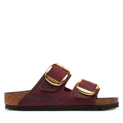 Klapki Birkenstock. Czerwone klapki Birkenstock, bez wzorów, bez obcasa. Za 569.99 zł.